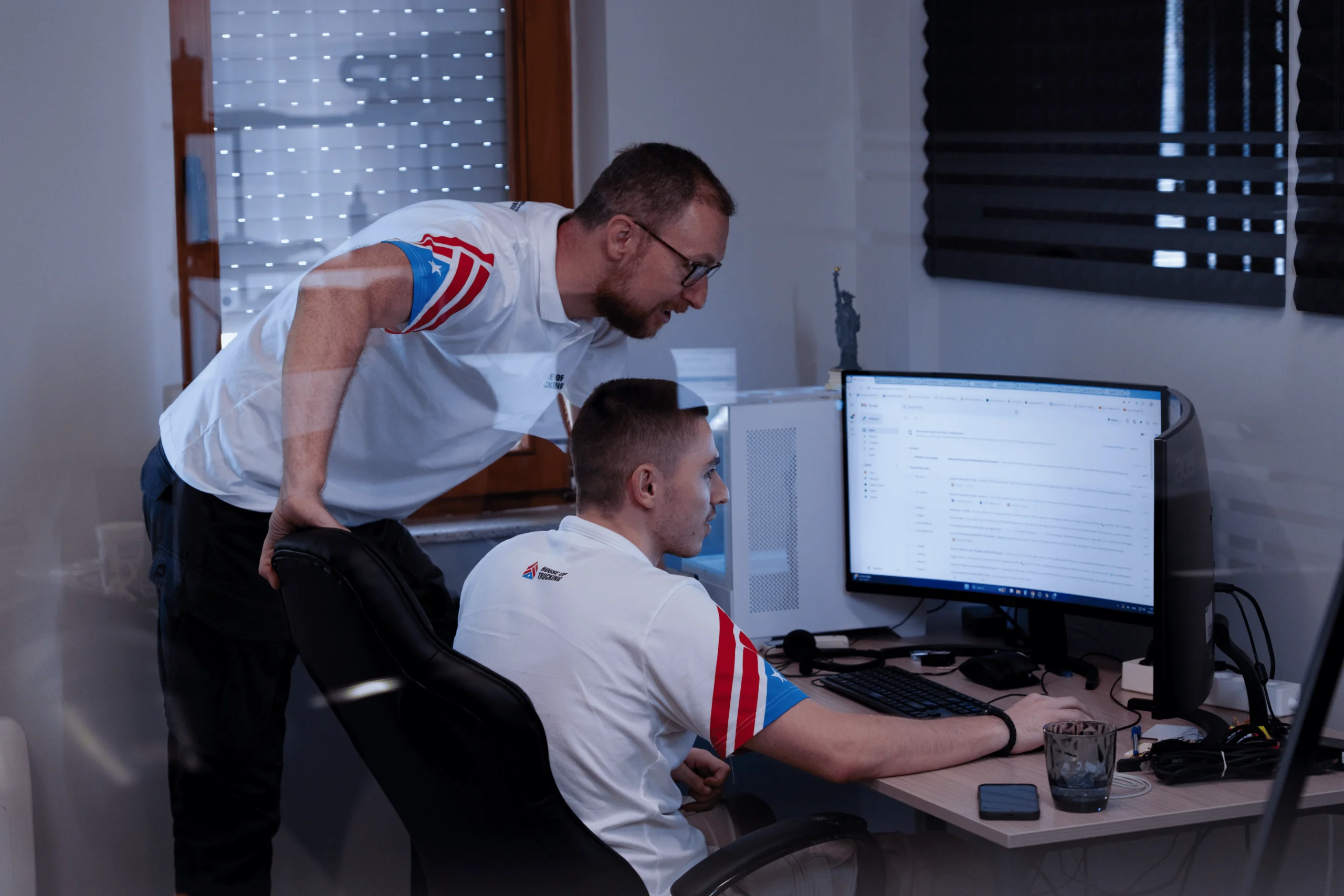 Logistics team working together on dispatch and tracking tasks