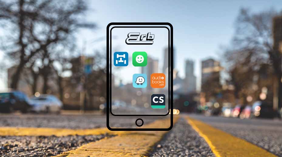 Smartphone with trucking apps displayed on screen